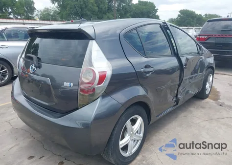 2014 Toyota Prius C One from USA, damaged, VIN JTDKDTB35E1061755